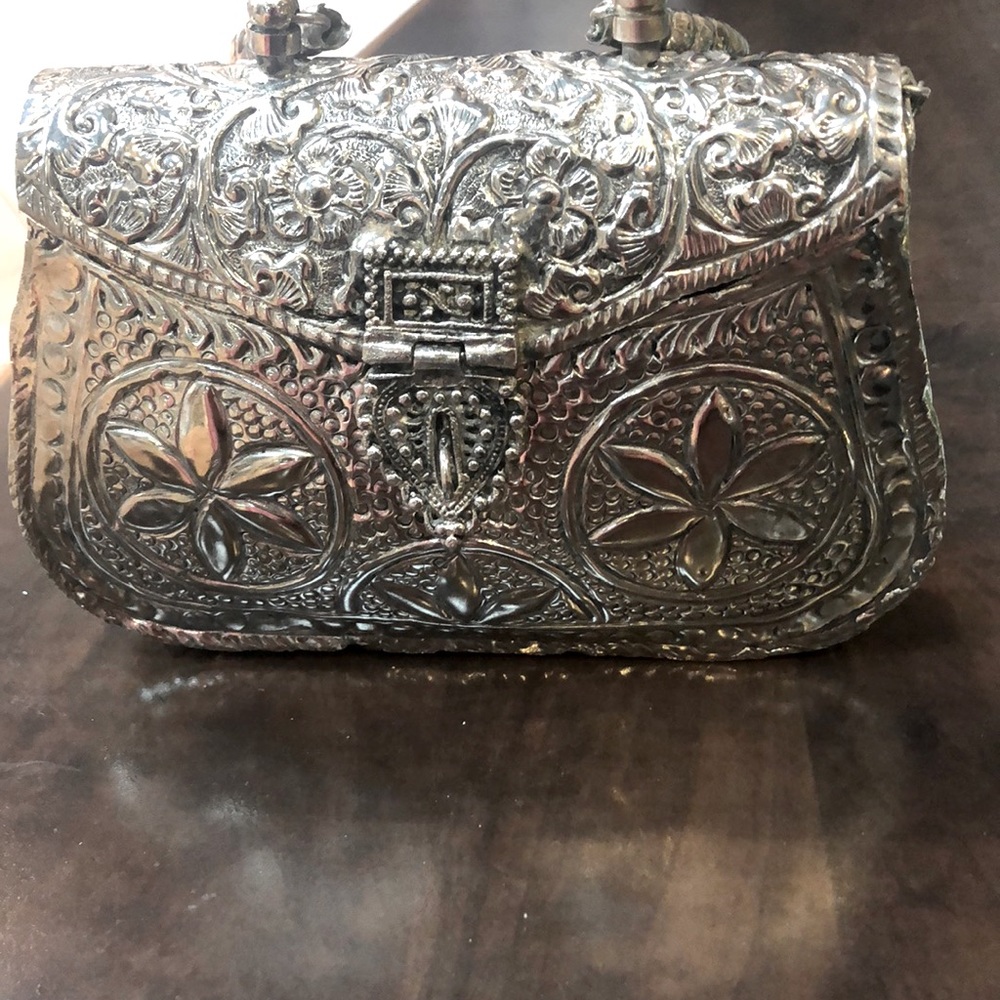 Handcrafted metal clutch bag